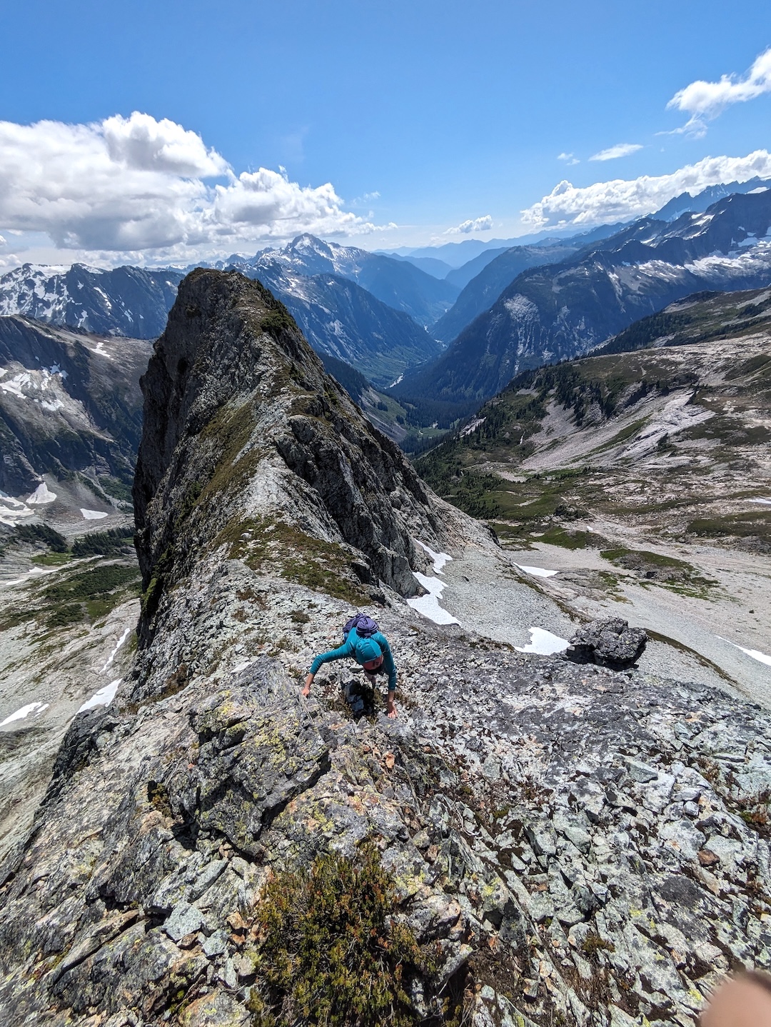 Lani Chapko scrambling above the midway notch on The Imperfect Bypass, the southwest ridge of Whatcom Peak. 