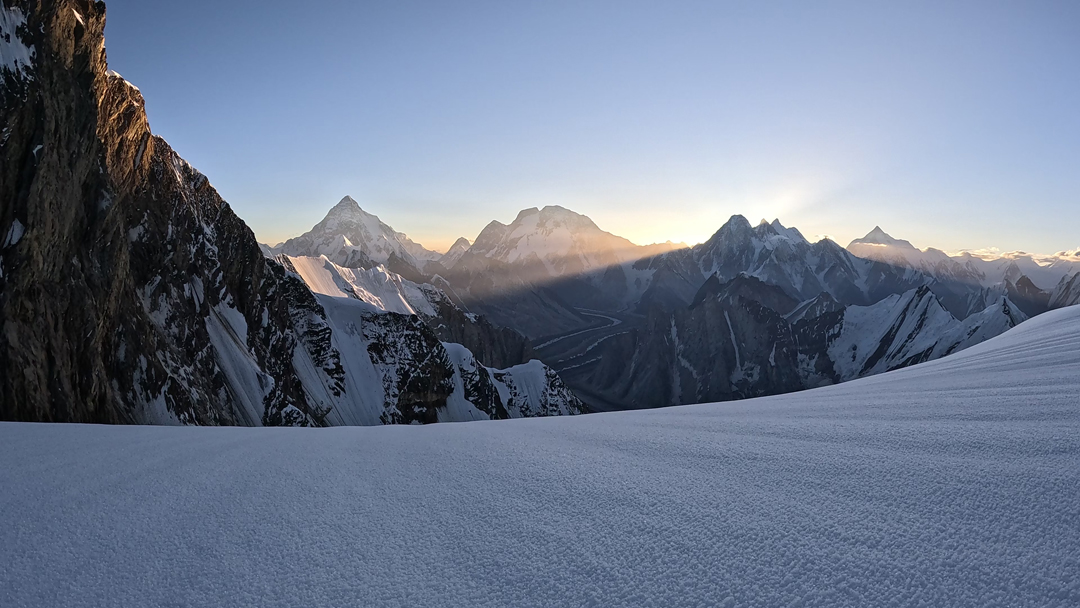 The view east from the 6,300-meter col between Biarchedi I and II. From left to right: K2, Broad Peak, Gasherbrums IV, III and II, and on the right the pointed Gasherbrum I. 