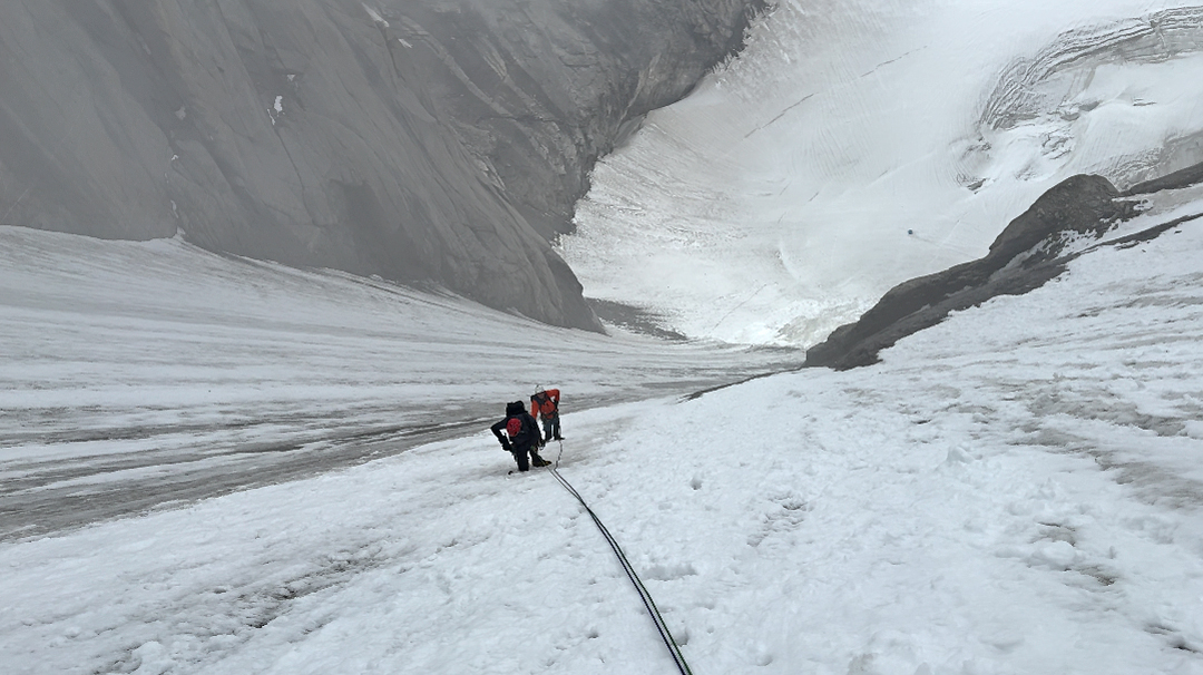 Above 5,700 meters in the ramp/couloir on the south face of Hidden Tower, as the weather closed in. 