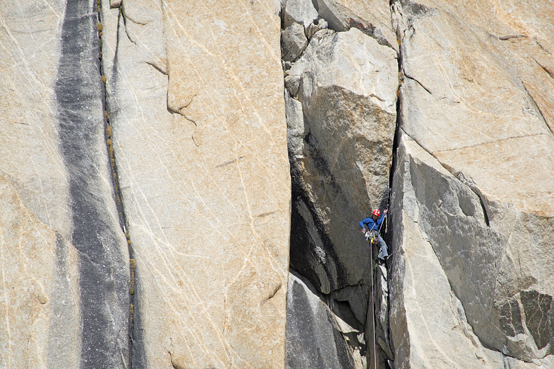 Yudai Suzuki starts up the overhanging wide crack on the first pitch of the east pillar of Hasho Peak II.  