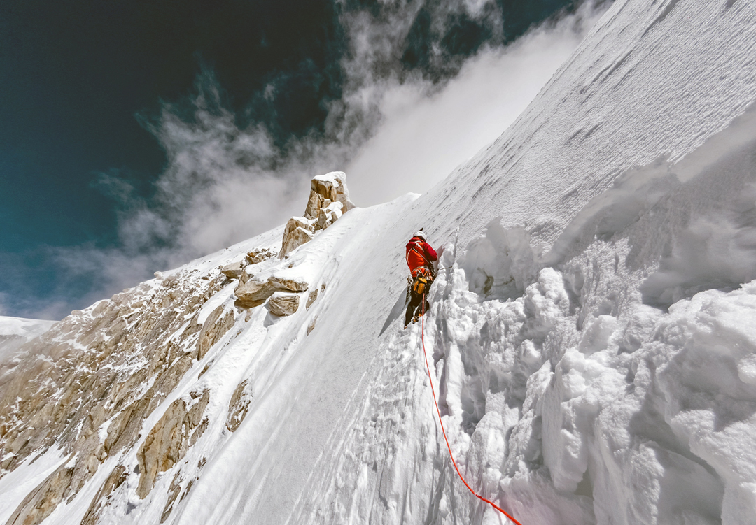 Mueez Ud Din on mixed ground, above 6,500 meters, during the third day of the climb on the east ridge of Spantik.