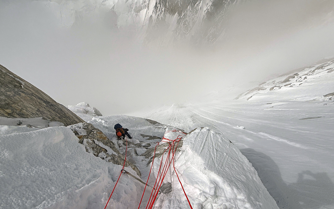 Mueez Ud Din follows mixed ground during the third day on the east ridge of Spantik. 