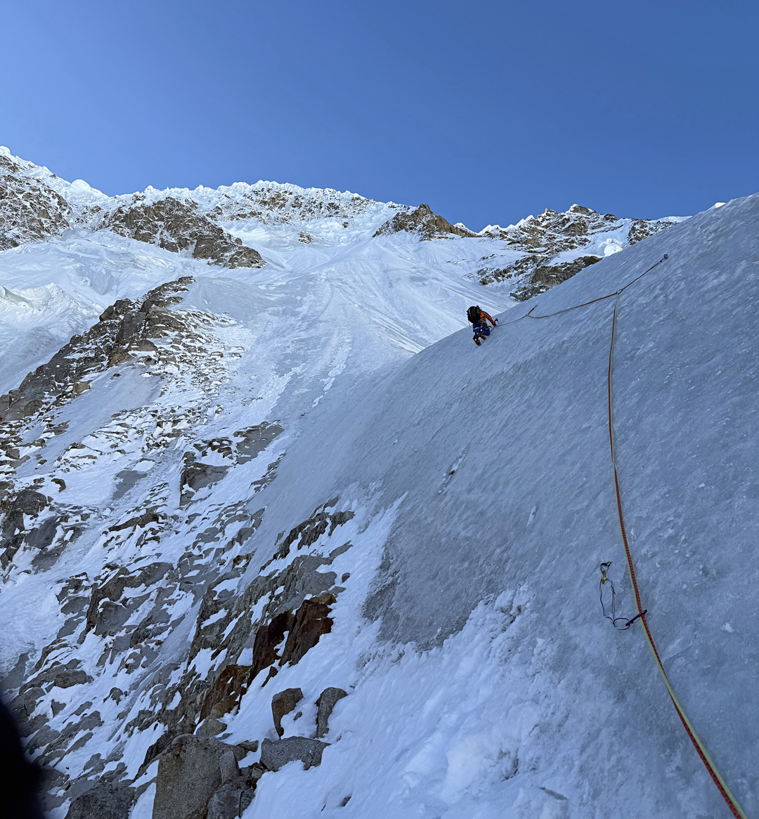Matej Prcin on the spur above the first bivouac, and before the rightward traverse, on the northwest face of Tumladen Sar. 
