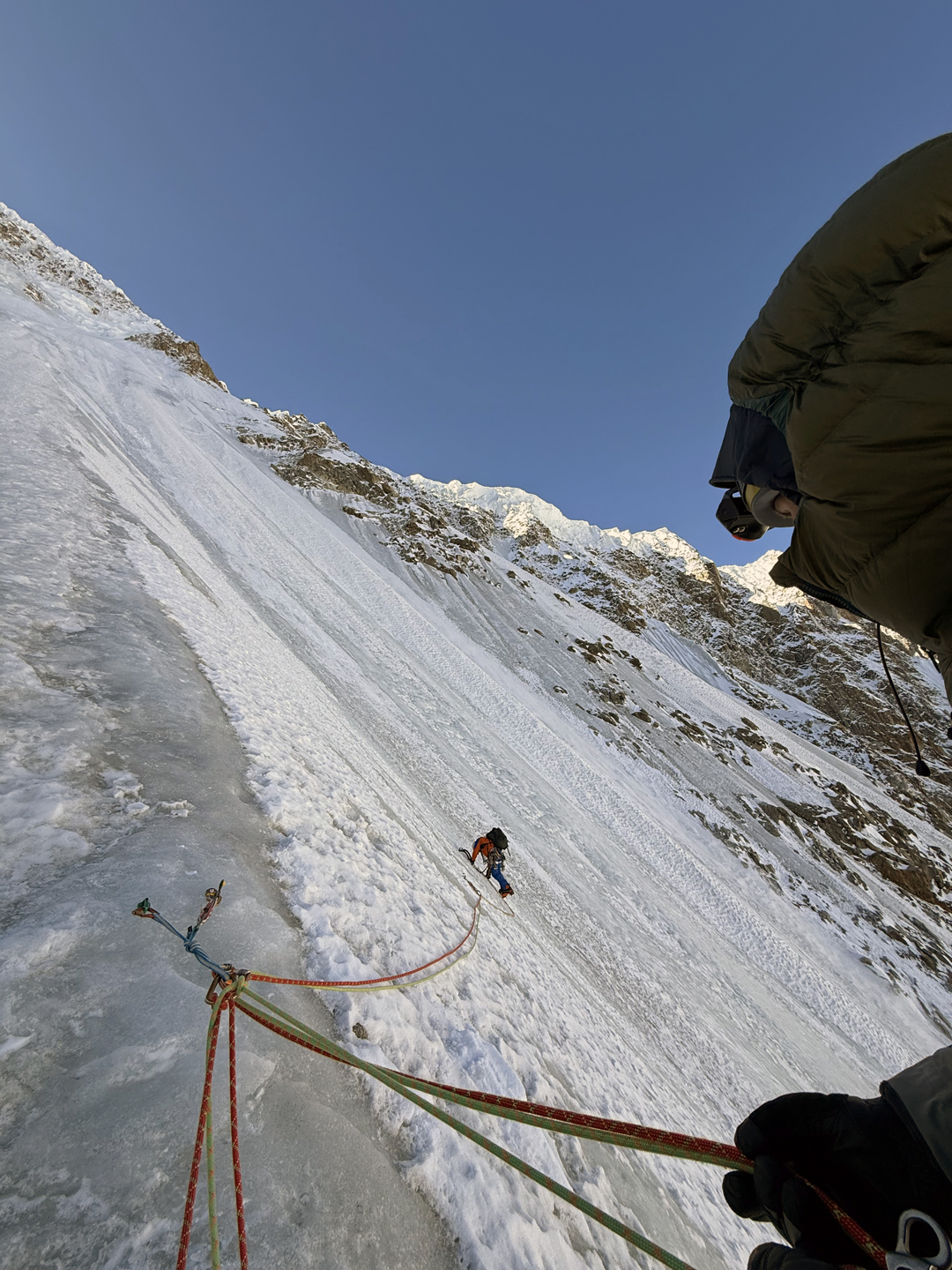 Matej Prcin embarks on the rightward traverse during the second morning of the first ascent of Tumladen Sar.