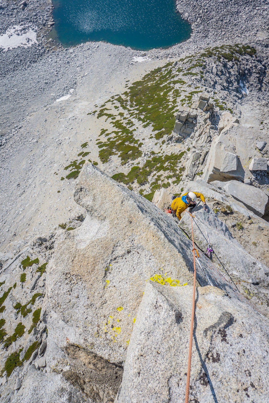 Chris Robertson following the airy arête near the summit of Mt. Crocker’s west pillar.