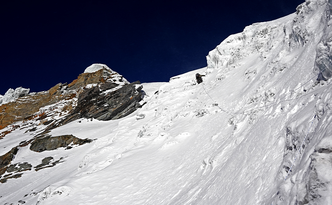 Approaching the top of the east face glacier and heading for the summit (the ice-capped dome on left) of Sharphu VI. 