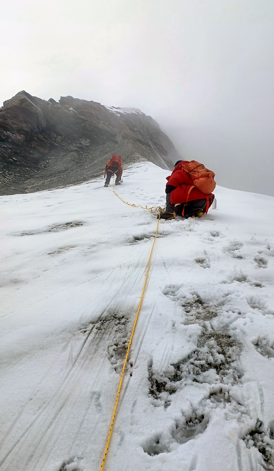 Rope fixing during summit day on the east ridge of Peak 5,970m.  