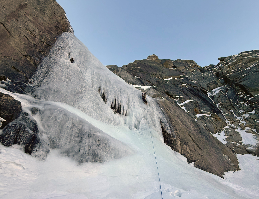 Seth Timpano on the first pitch of the northwest face of Peak 5,400m. 