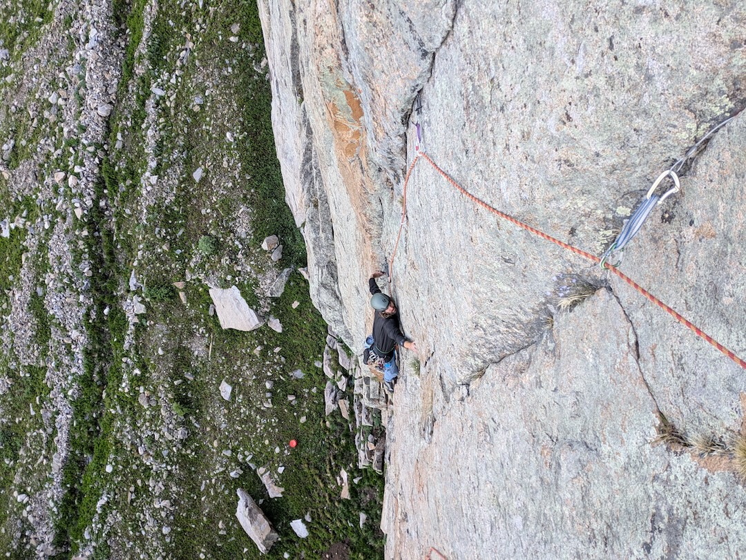 Michael LaDue climbing on pitch one of Unoriginal Sin. 