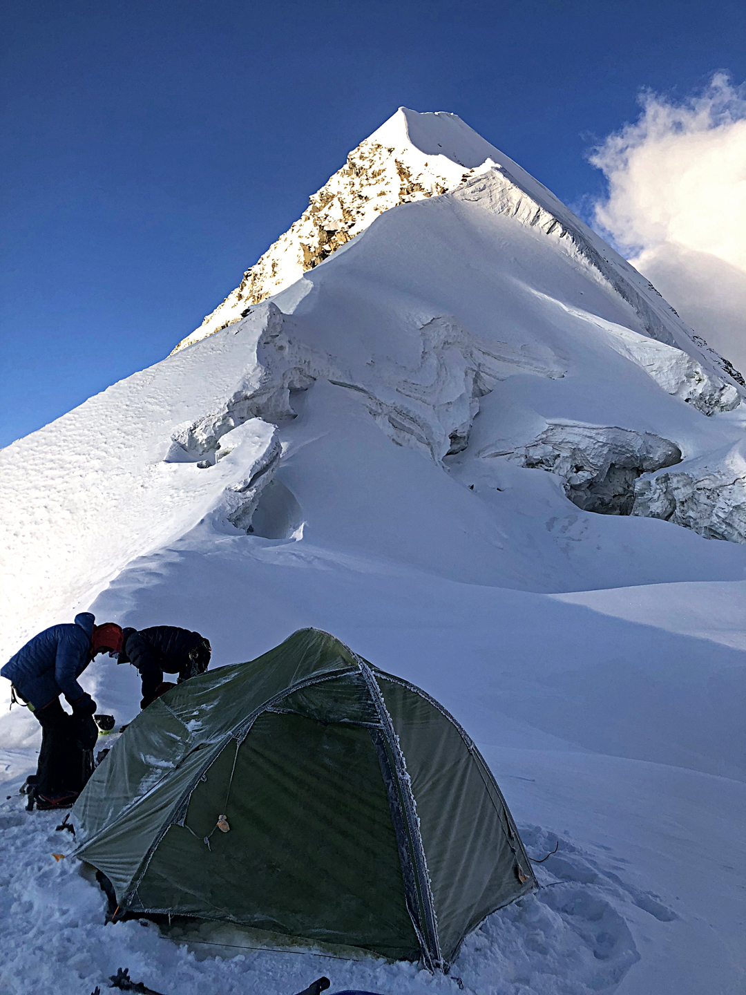 The 6,100-meter camp on the northeast ridge of Bhagirathi II, with the final knife-edge ridge leading to the summit.