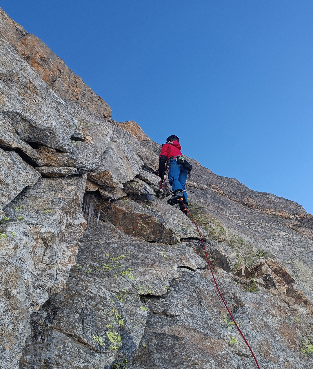 Olga Paducheva on the morning of the second day of Karma on the southwest face of Iris Peak. 