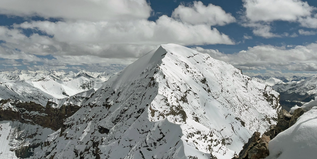 Unclimbed Monto I (6,331m) from the summit of Monto II. 