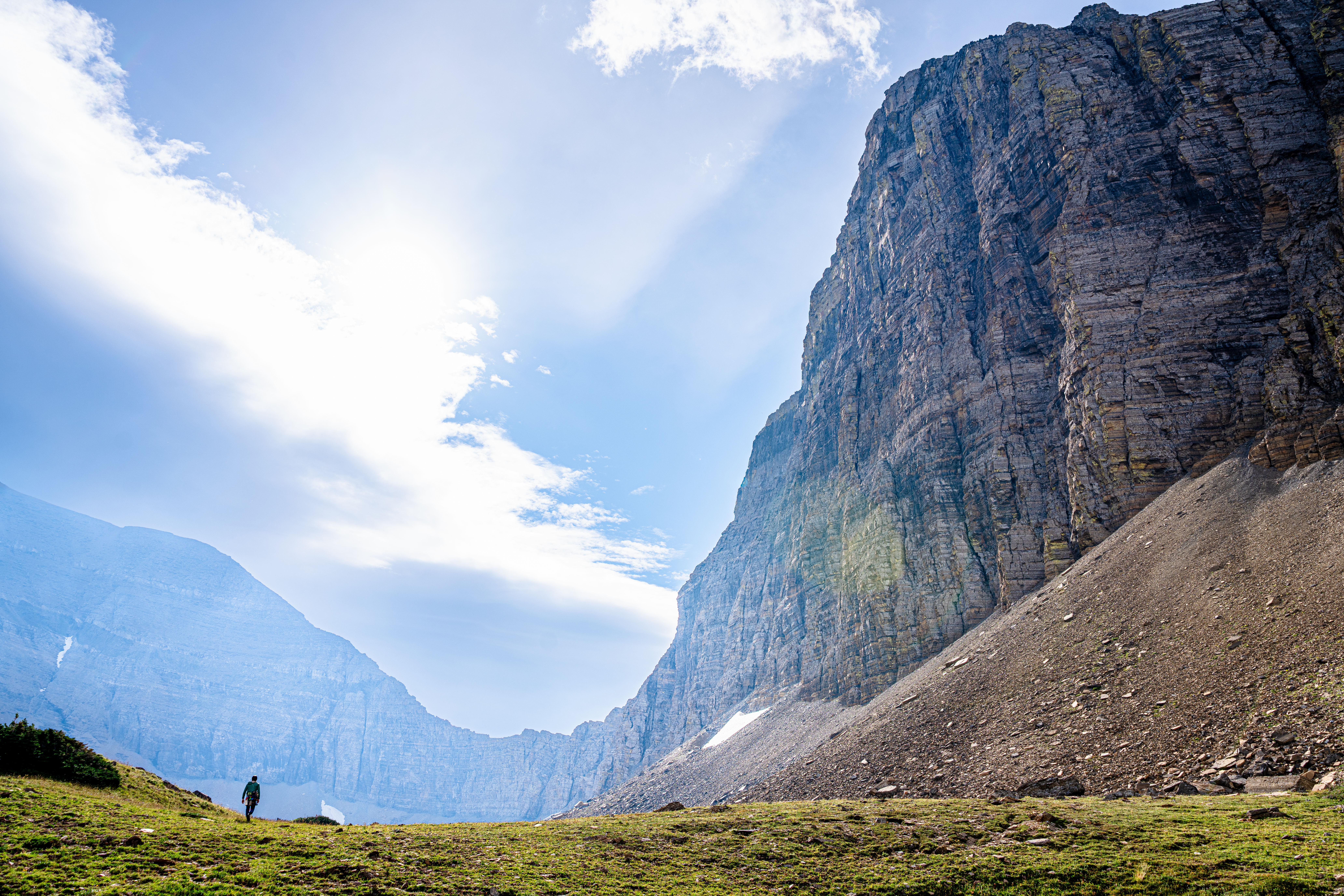 The north face of Cataract Mountain (right) and part of Mt. Siyeh. The route on Cataract is on the left side of the broad north wall. 