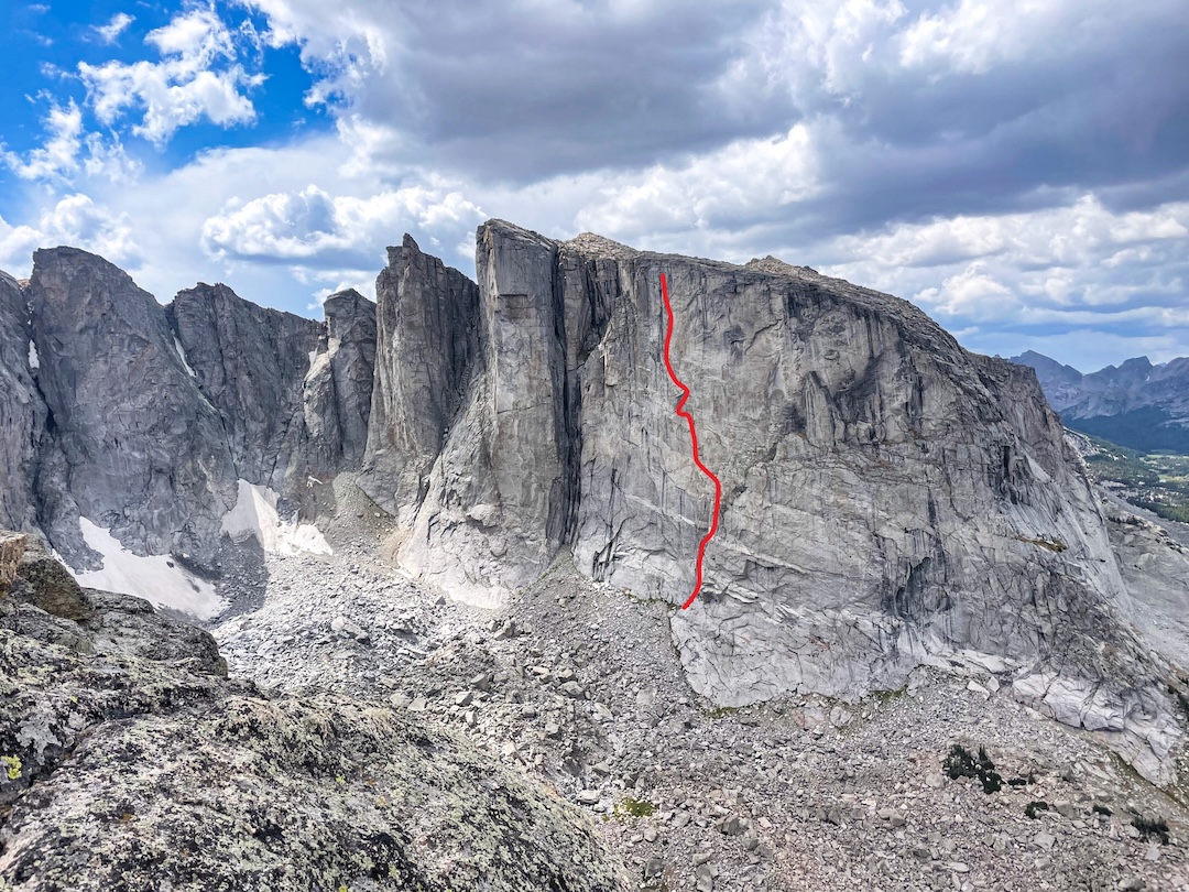 Sunset Wall with the line of Holding Out for a Hero (1,000’, 5.12- C1) as of the end of 2025. The prow at the left end of the wall is Cowcatcher, with Wombat Spire just to its left. 