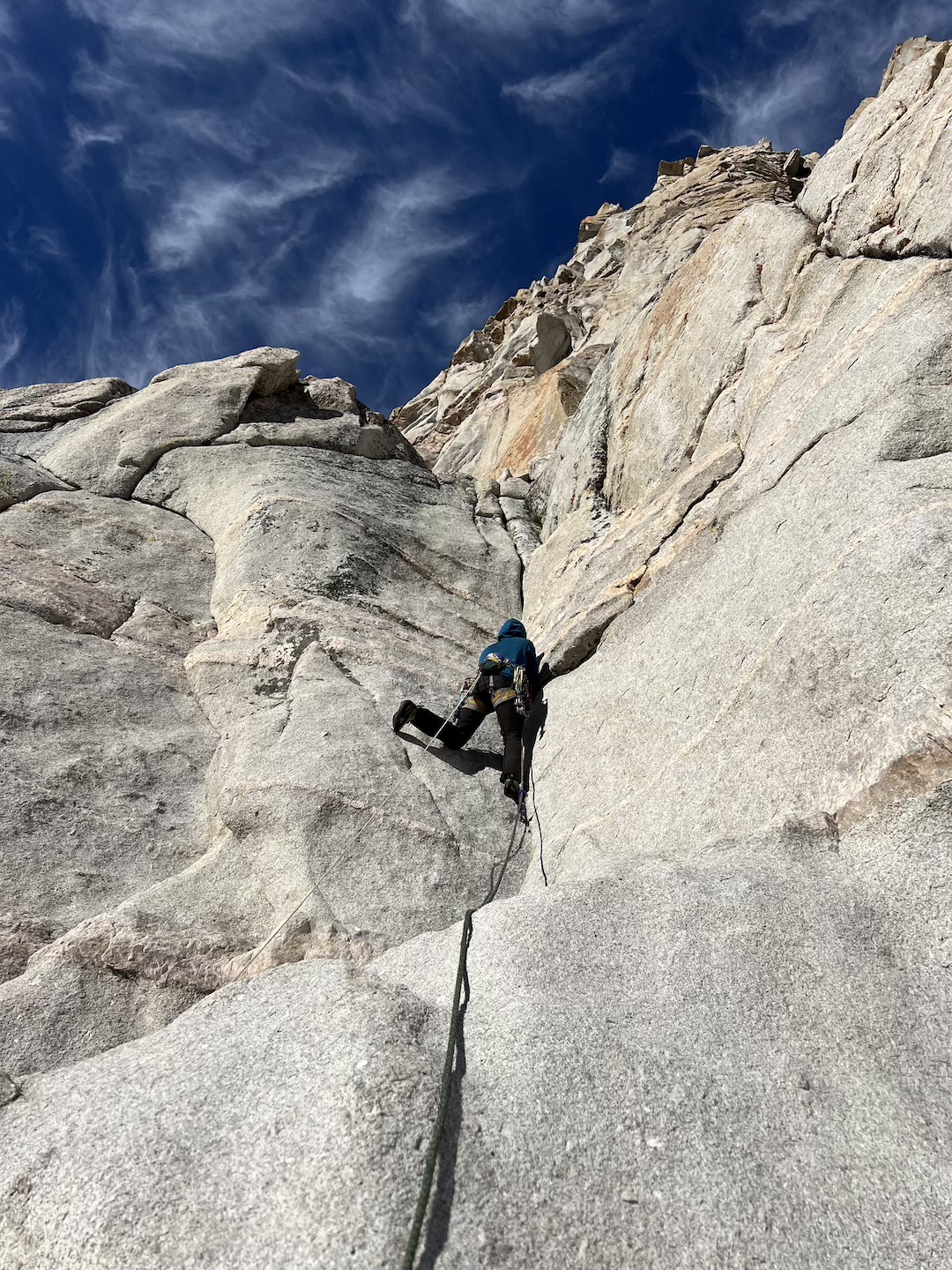 Henry Feder on the first pitch of Endemic Species (1,200,’ 5.11+) on Flatiron Butte.  