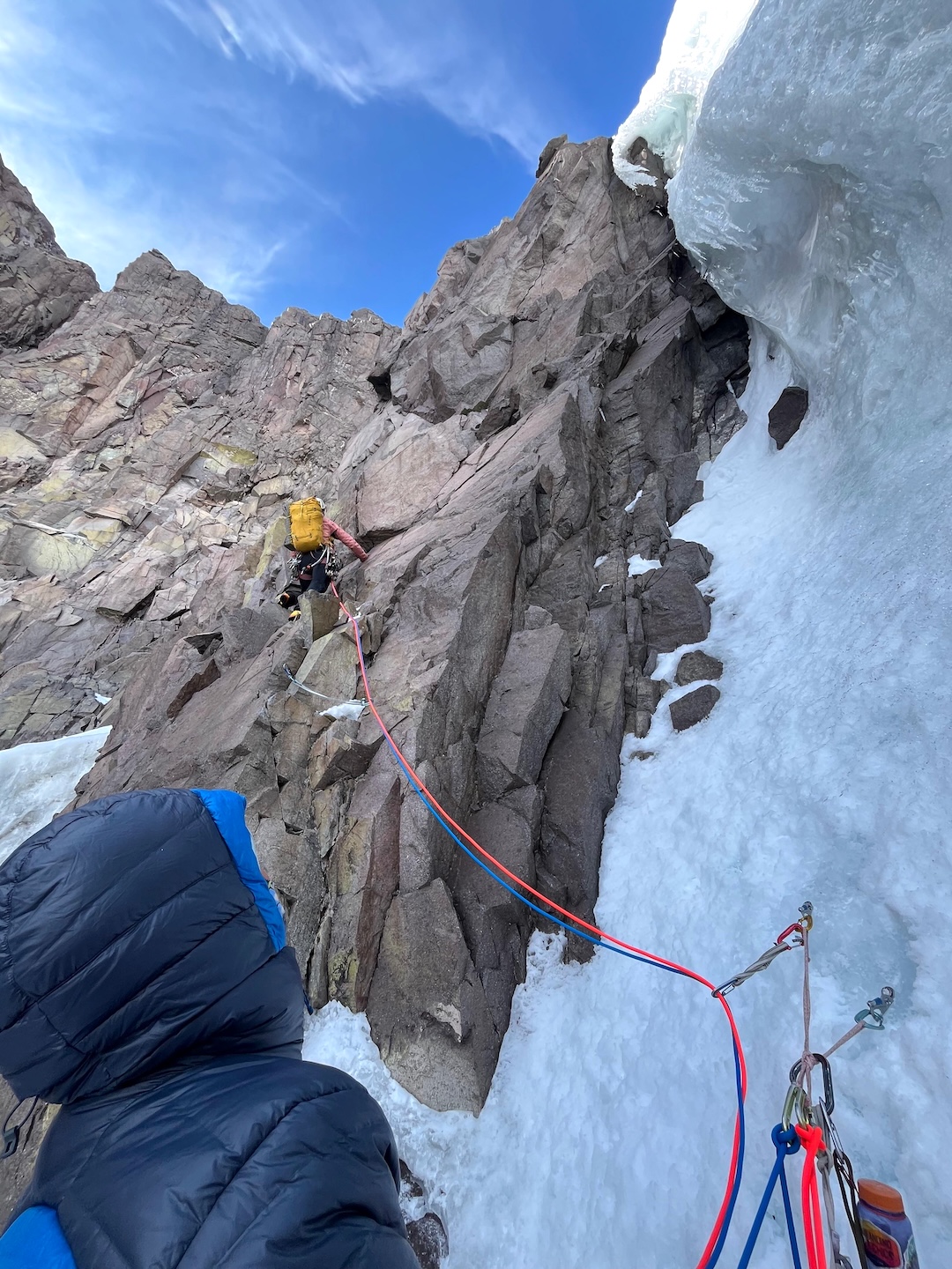 Angelina Di Prinzio leading rocky terrain to avoid sunbaked overhanging ice
above them. 