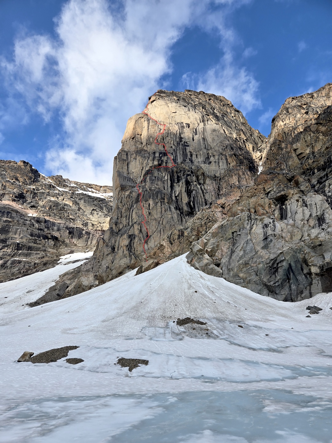 The route line of Follow the Sun (520m, 5.10) on the east/southeast face of an unnamed tower located 1.85km to the west of Mt. Northumbria.  