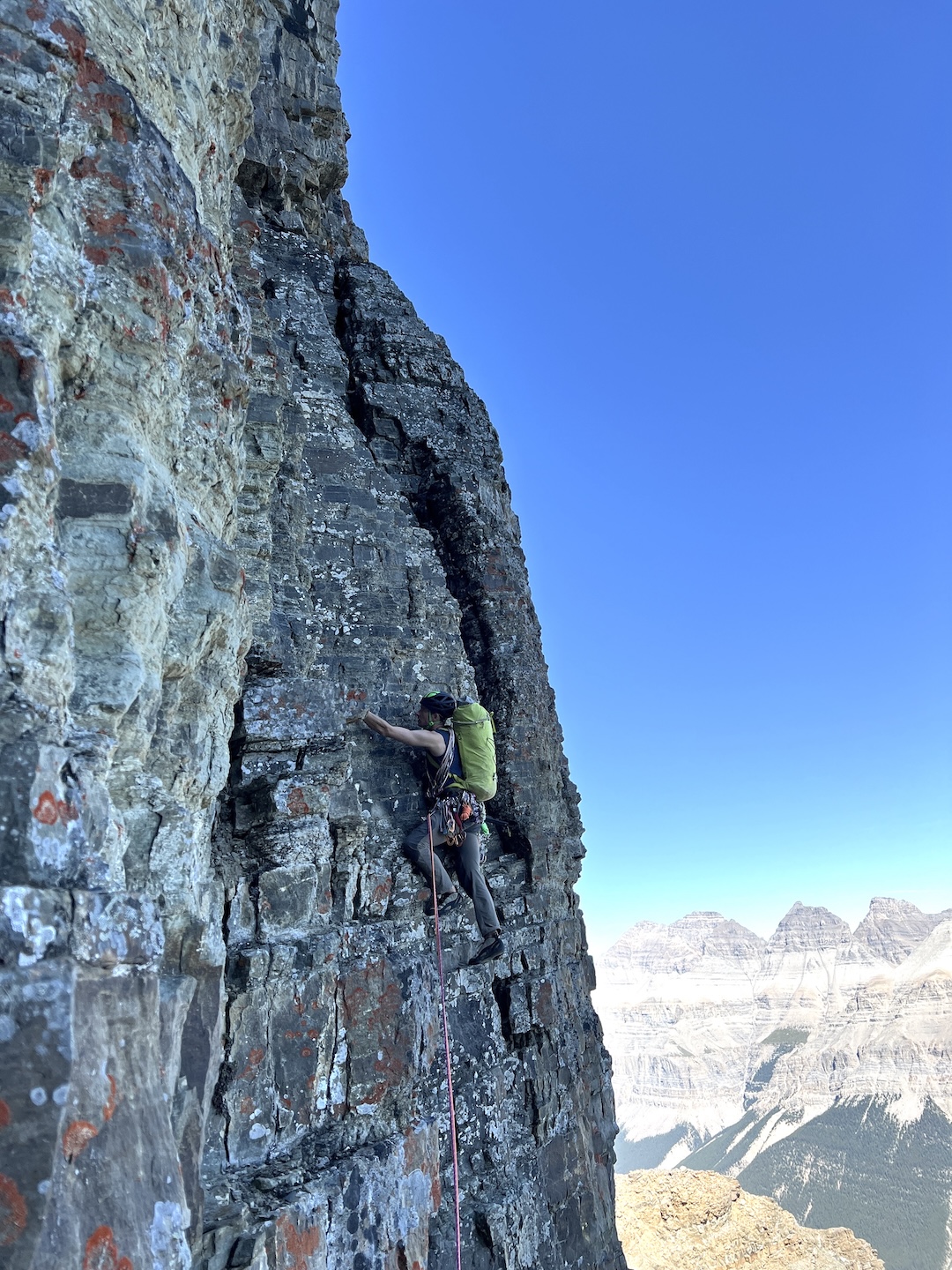 Greg Barrett cruising with little pro on Snafflehound Spine, east face of Mt. Chephren. 