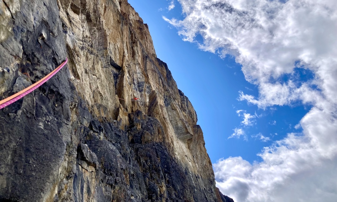 Greg Barrett navigating a traverse pitch on the northwest headwall of Castle Mountain. 