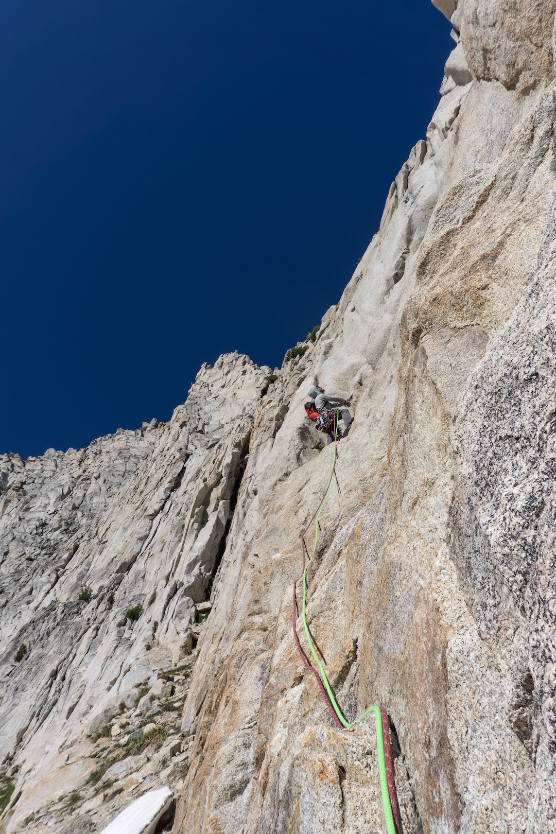 Zach Lovell leads a pitch low on the route during the first ascent of Shits and Glitters (800’, 7 pitches, 5.10a). 
