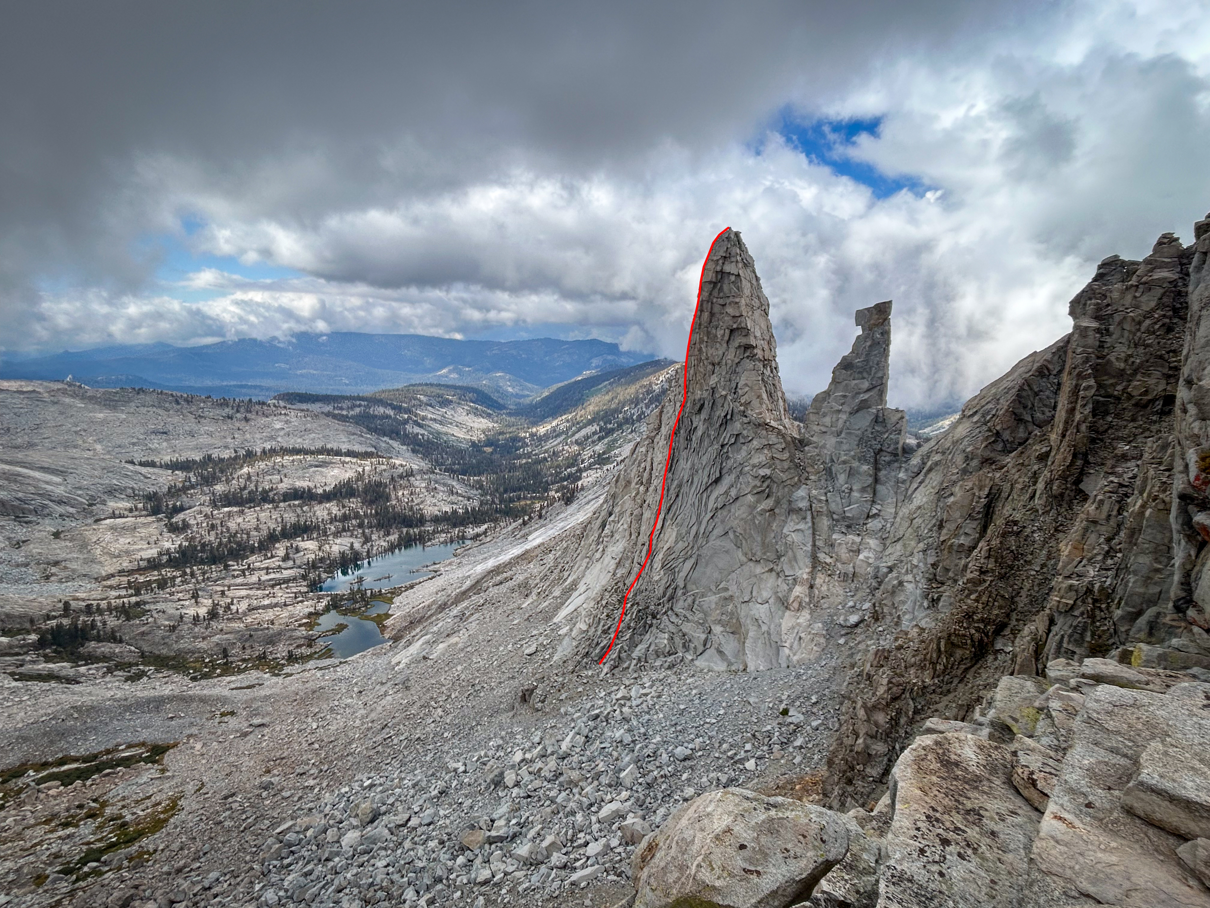 The west face of the Candlestick, seen from the south, with the route drawn in on the skyline. 