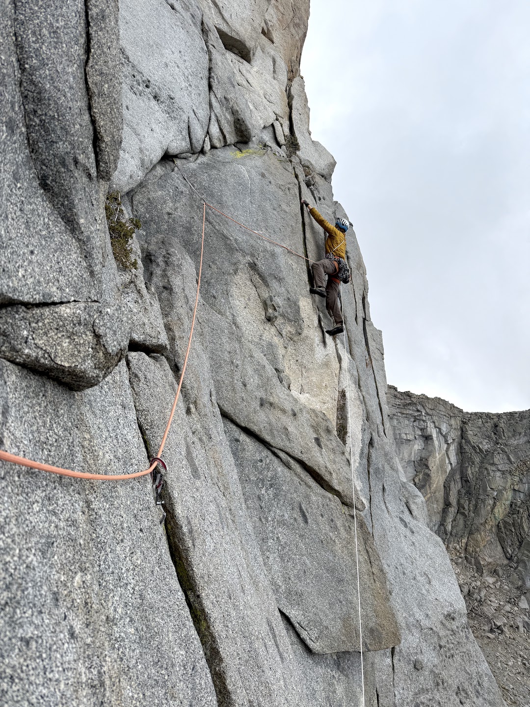 Daniel Jeffcoach traverses out below the headwall on the west face of the Candlestick, Sequoia National Park. 