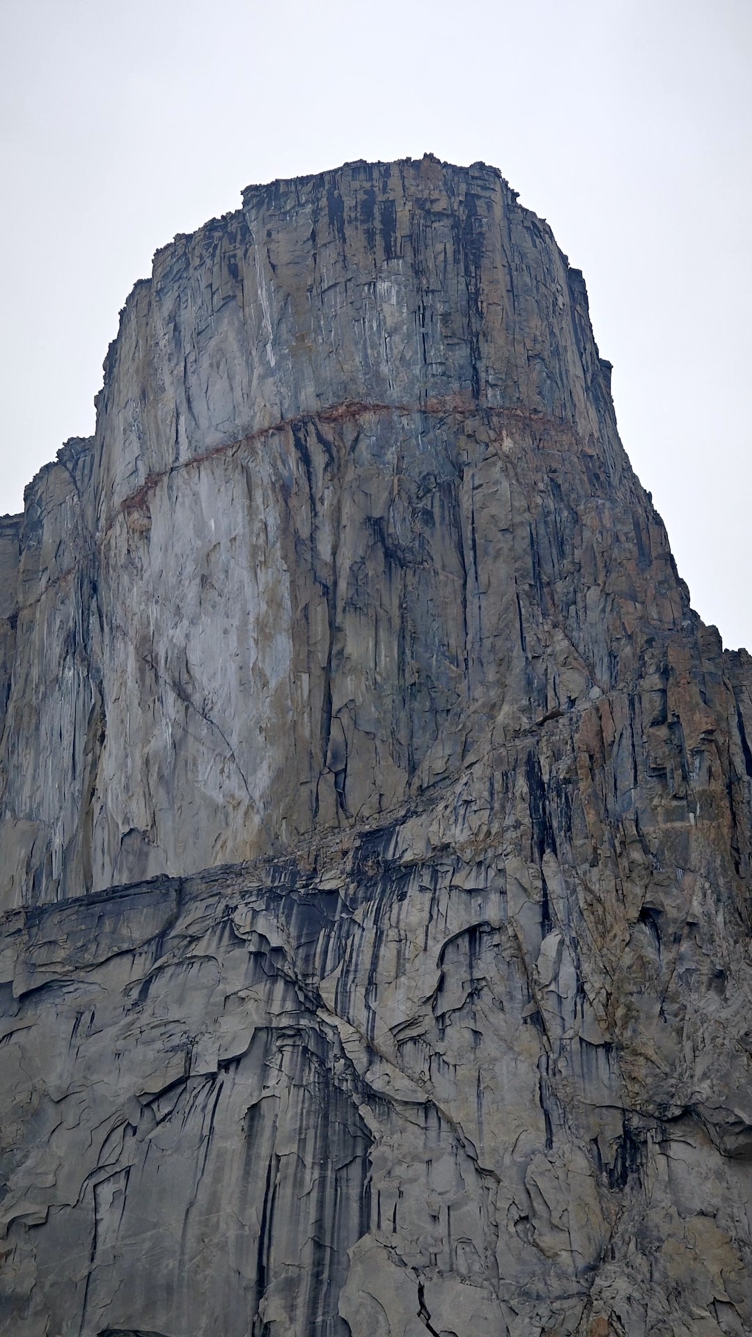 The north side of the peak nicknamed “Mini-Asgard” for its resemblance to Mt. Asgard. The first ascent angled up left to right across the lower face, then finished near the right skyline. 