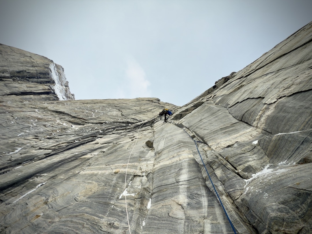 Kylus Hart aiding below the upper headwall on Sikunga Mountain.