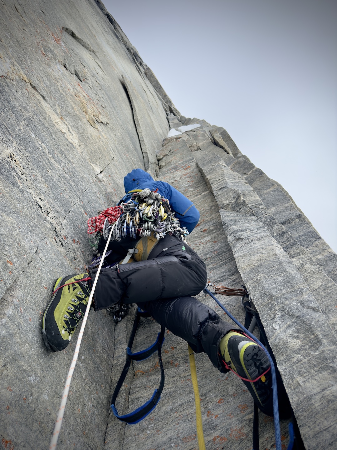 Kylus Hart leading up the splitter corners of the upper headwall on Sikunga Express. 