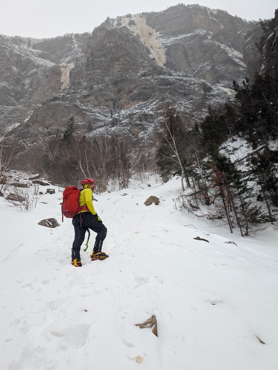 Approaching La Pomme d’Or, the huge ice line in center. The new route, Les Chercheurs d’Or, went up the rock wall to the right of La Pomme d’Or. 