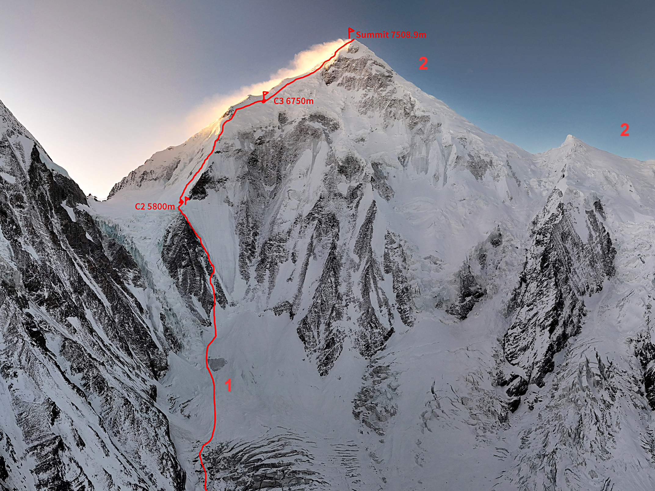 The ca 2,300-meter north face of Minya Konka rises above the upper Yanzigou Glacier. (1) 2018 Chinese Route up the north-facing spur and northeast ridge, repeated in 2024. (2) 1932 American Route on the northwest ridge.