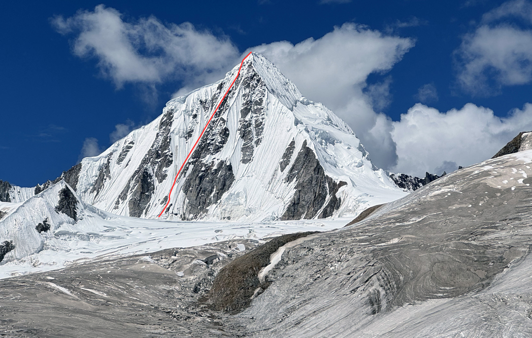 The east face of Sendho and route of the first ascent, seen from the Aigagon (a.k.a. Yiga) Glacier during the approach.