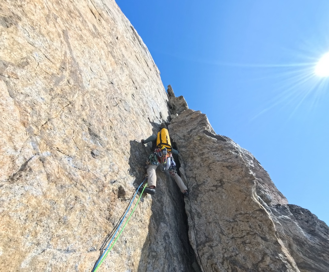 Marco Dattolo leading the first pitch of the final headwall (6b+), a 60-meter rope length, on the southwest side of Titan II. 
