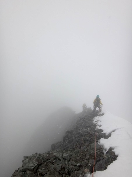 Deteriorating weather during the descent from the summit of Ushba South.