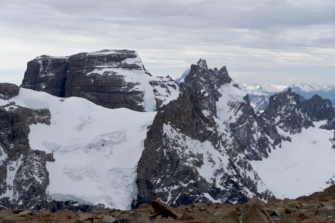 View to the north from the summit of Cerro Brechón. Cerro Mesón is the big flattop peak, unnamed and unclimbed peaks are on the right, and Fitz Foy is tucked away in the distance. 