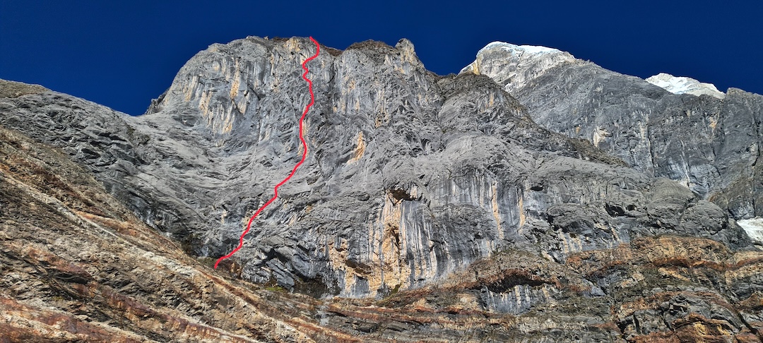 The line of Estrella (250m, 5.12a) on a limestone buttress near base camp in 2023. 