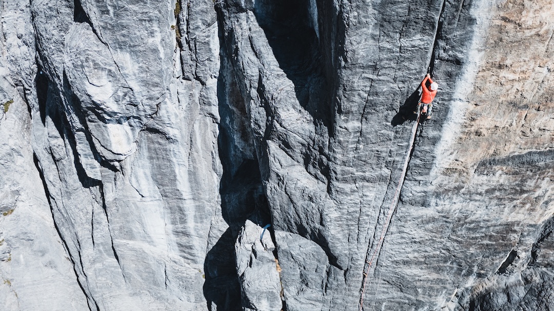 Alex Huber leading a steep crack pitch on the southeast face of Jirishanca. 