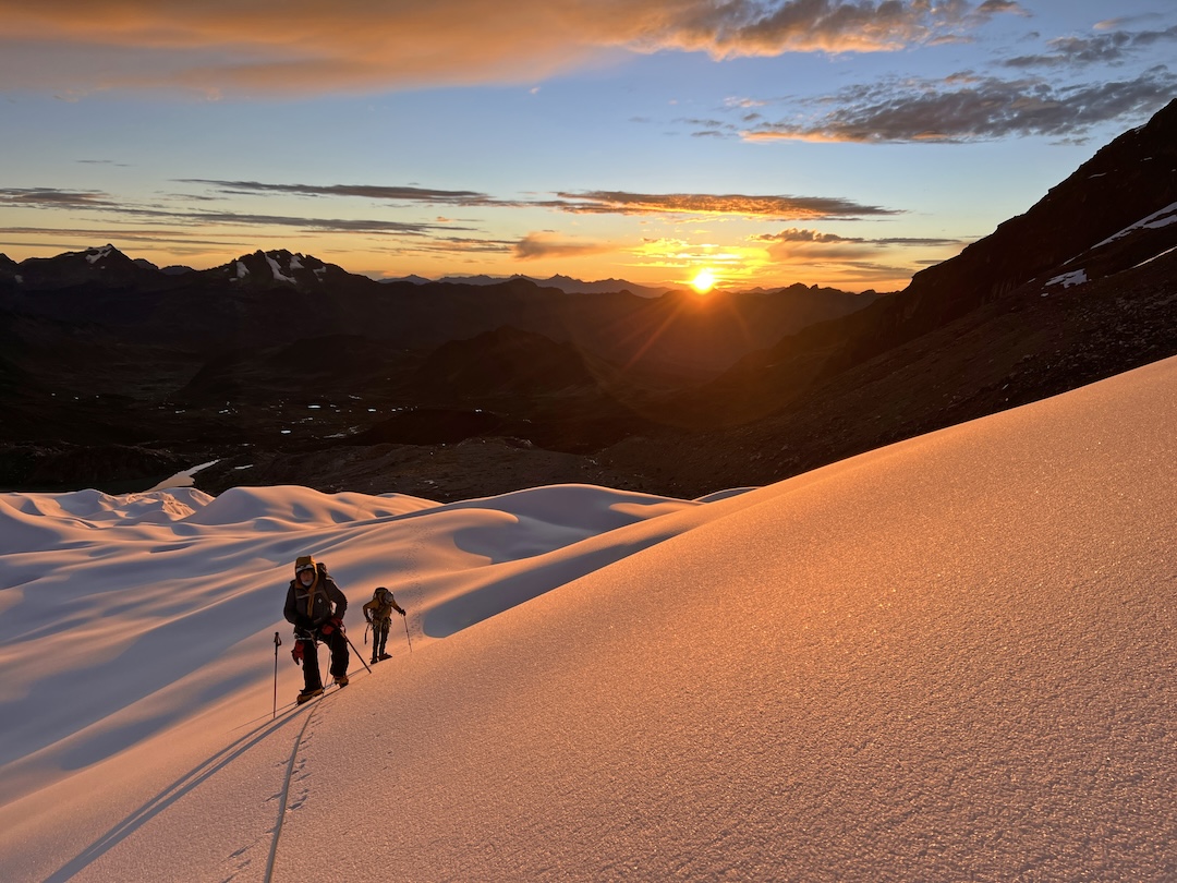 Sunrise during the ascent of the northern slopes of Nevado Verdish-Ventanilla. 