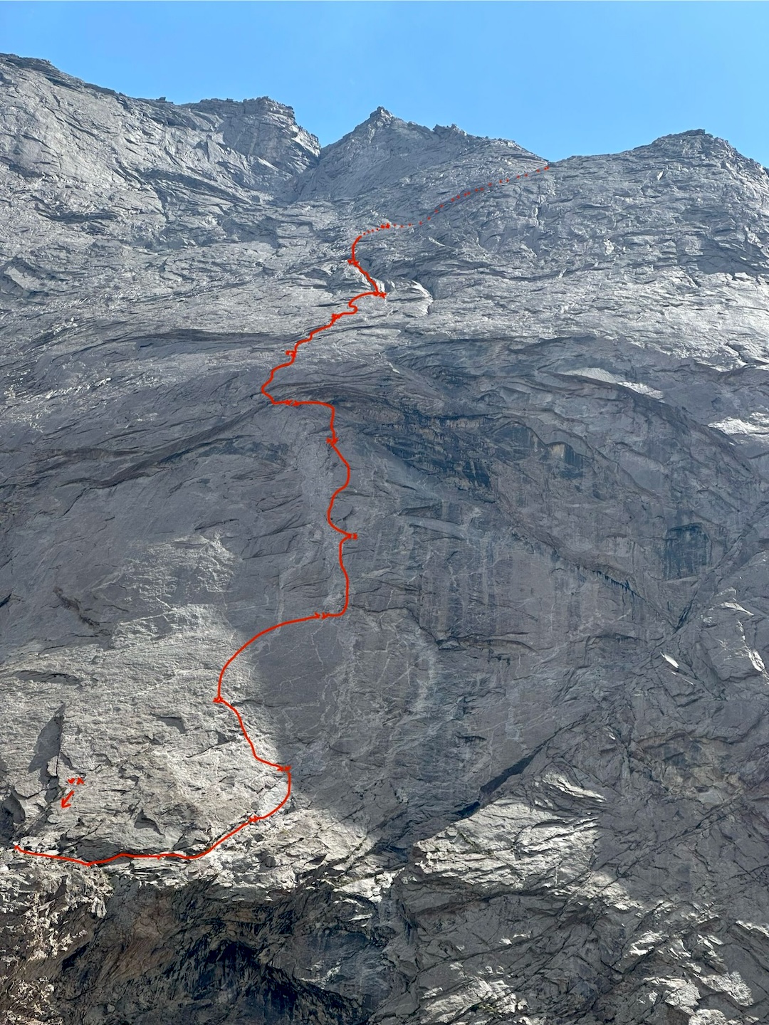 General view of the line of The Game of Forty on the Wall of Dykes. The route shares a start with Vivere la Vita (2022) and crosses the Philosopher's Stone (1999), both of which are not shown.