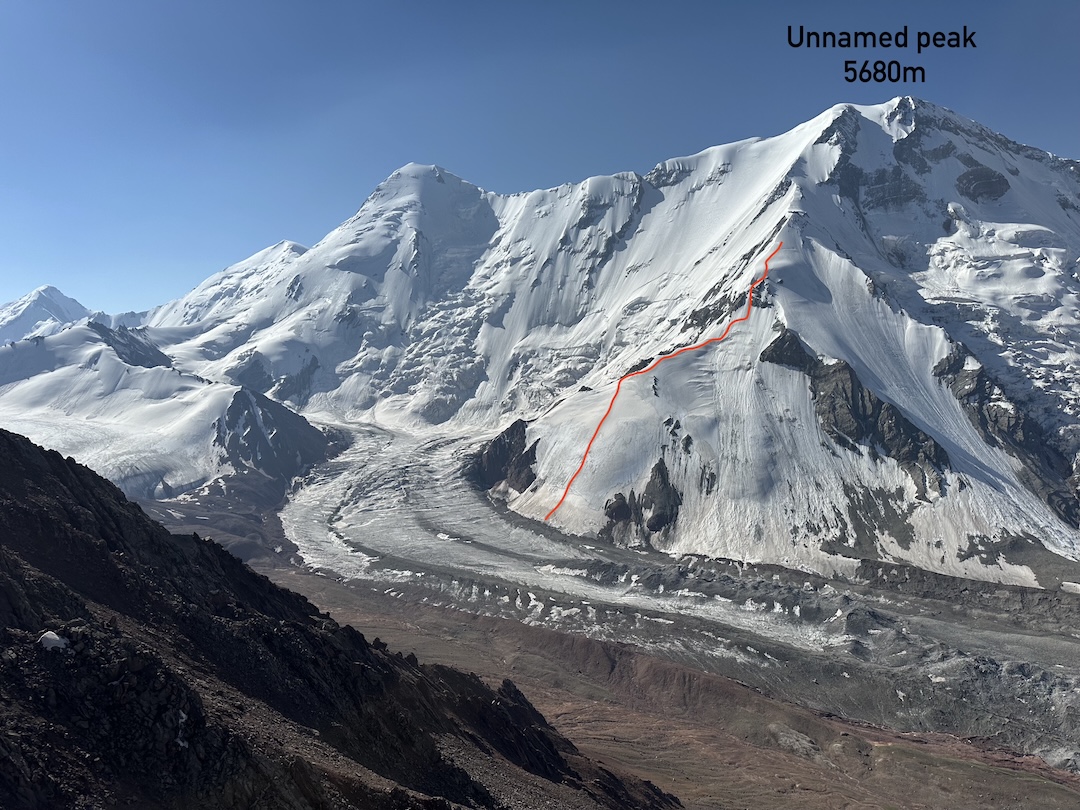 View across the eastern arm of the Nura Glacier to Leibniz Peak (5,797m) on the left, climbed by the north (left) shoulder in 2009, and unclimbed Peak 5,680m on the right. The broad ridge facing the camera was attempted in 2025, reaching a high point of about 5,100 meters.