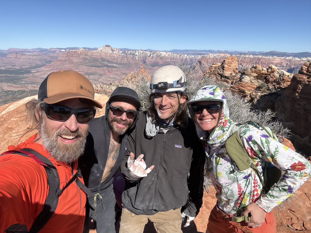(Left to right) James Wieman, Arturo Calvo, Jeffery "Sunny" Hartnett, and Samantha Cooke on the summit of the Gunsight, after climbing Time and midway through the Ziathlon, a human-powered triathlon Wieman came up with to celebrate his completion of the cliff’s first full route. 