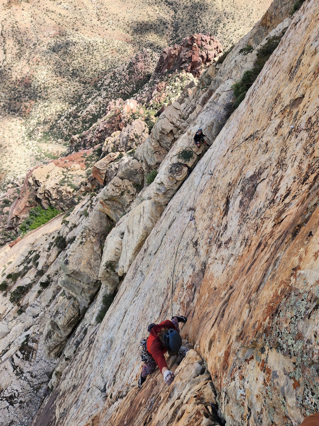 Sam Boyce leading the crux pitch on the Fin headwall during the first ascent of Fin Baggin' Society.