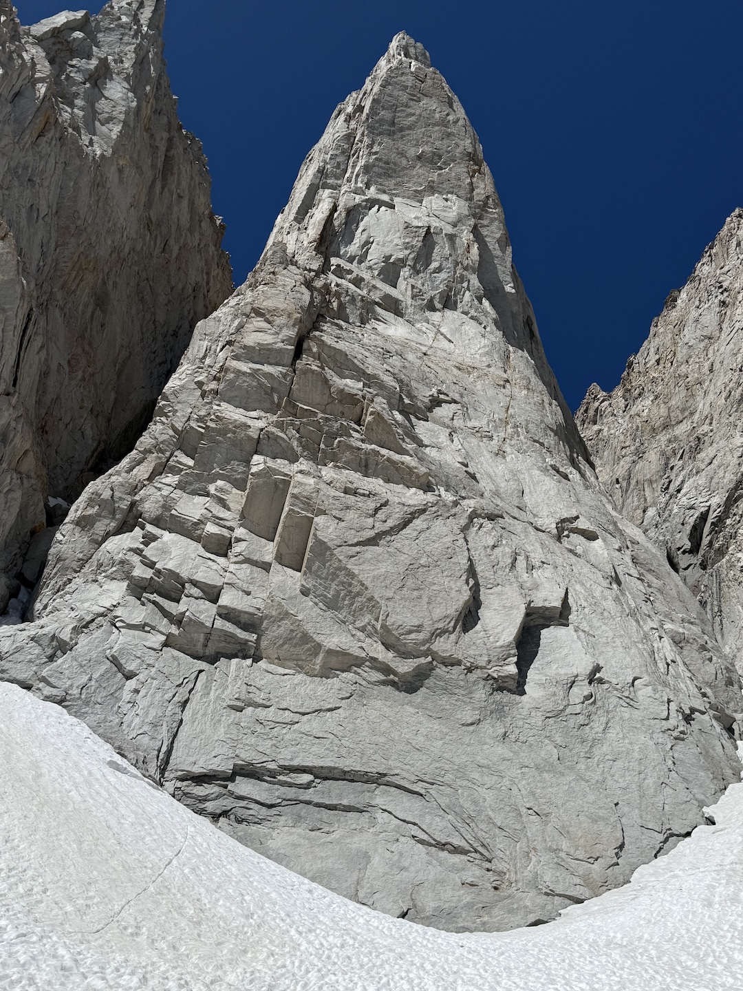 Looking up the east face of Keeler Needle. Stoned Ape Hypothesis ascends the left side of the face, running mostly parallel to the Harding Route (1960). 