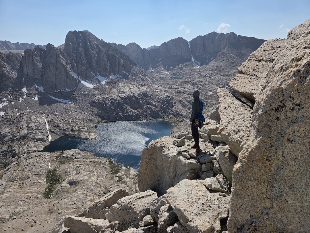 Daniel Dunn taking in the view during the first ascent of The Miterhorn (700’, 5 pitches, 5.8 or 5.10) on the Miter. 