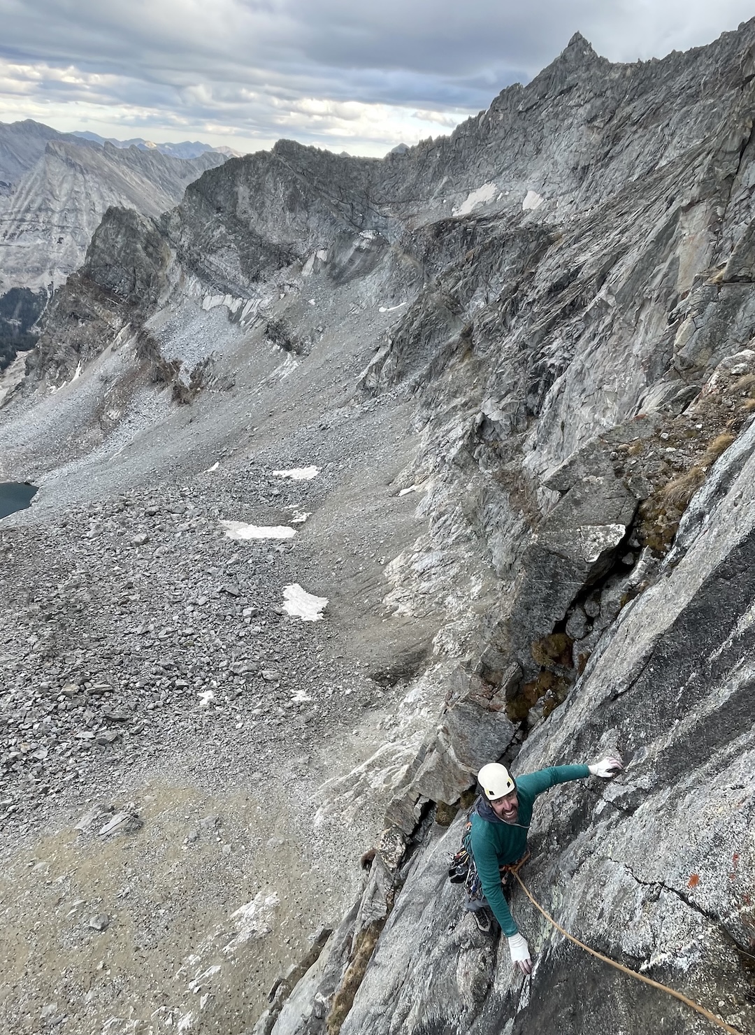 Drew Daly finishing the final moves on pitch three (5.10a) of A Beast the Color of Winter (7 pitches, 800’, IV 5.12b).