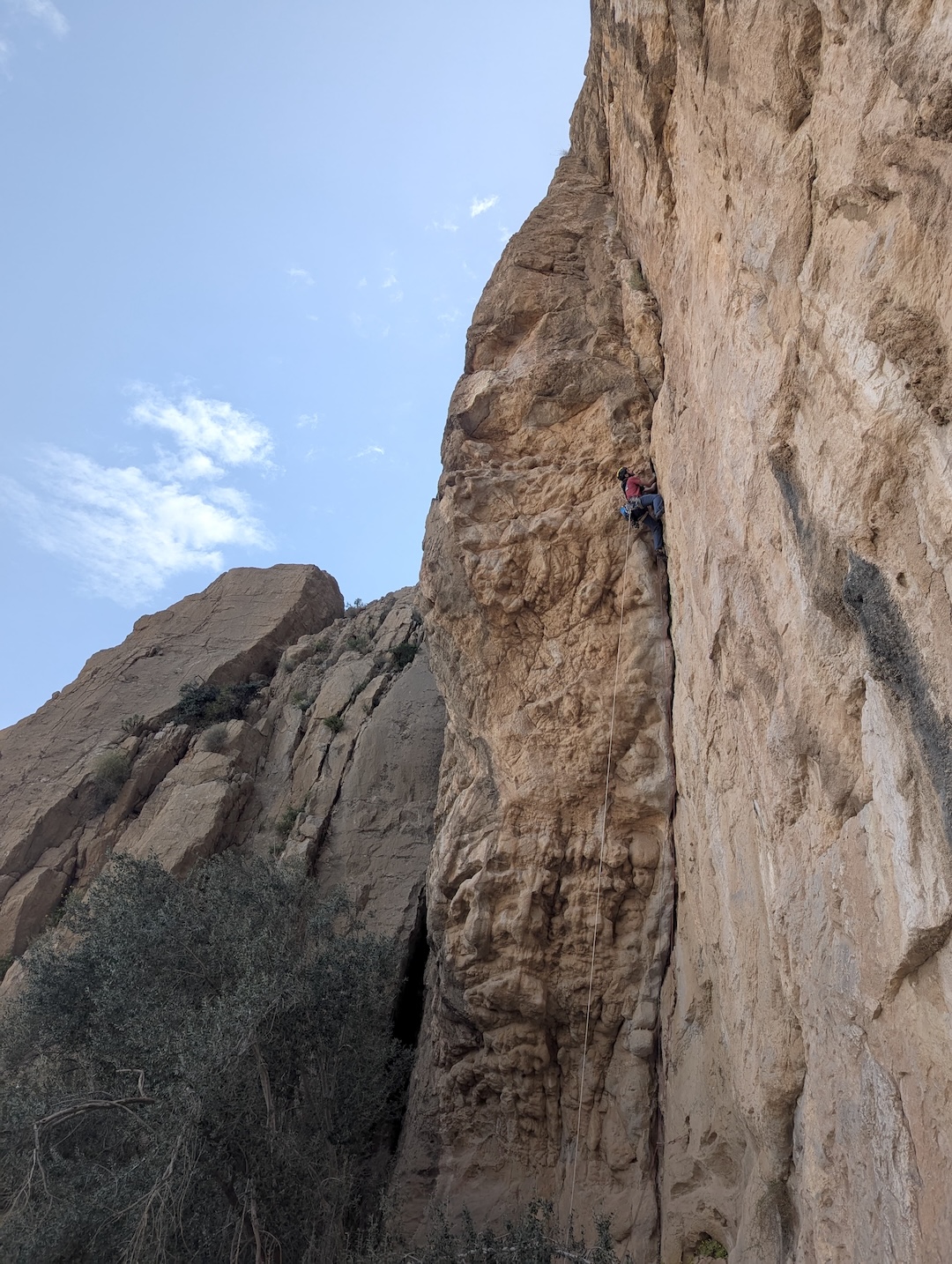Marco Ghisio on the steep corner crack of pitch one (7b) of Drips of Joy (500m, 7b max, 7a mandatory), Said Wall. 