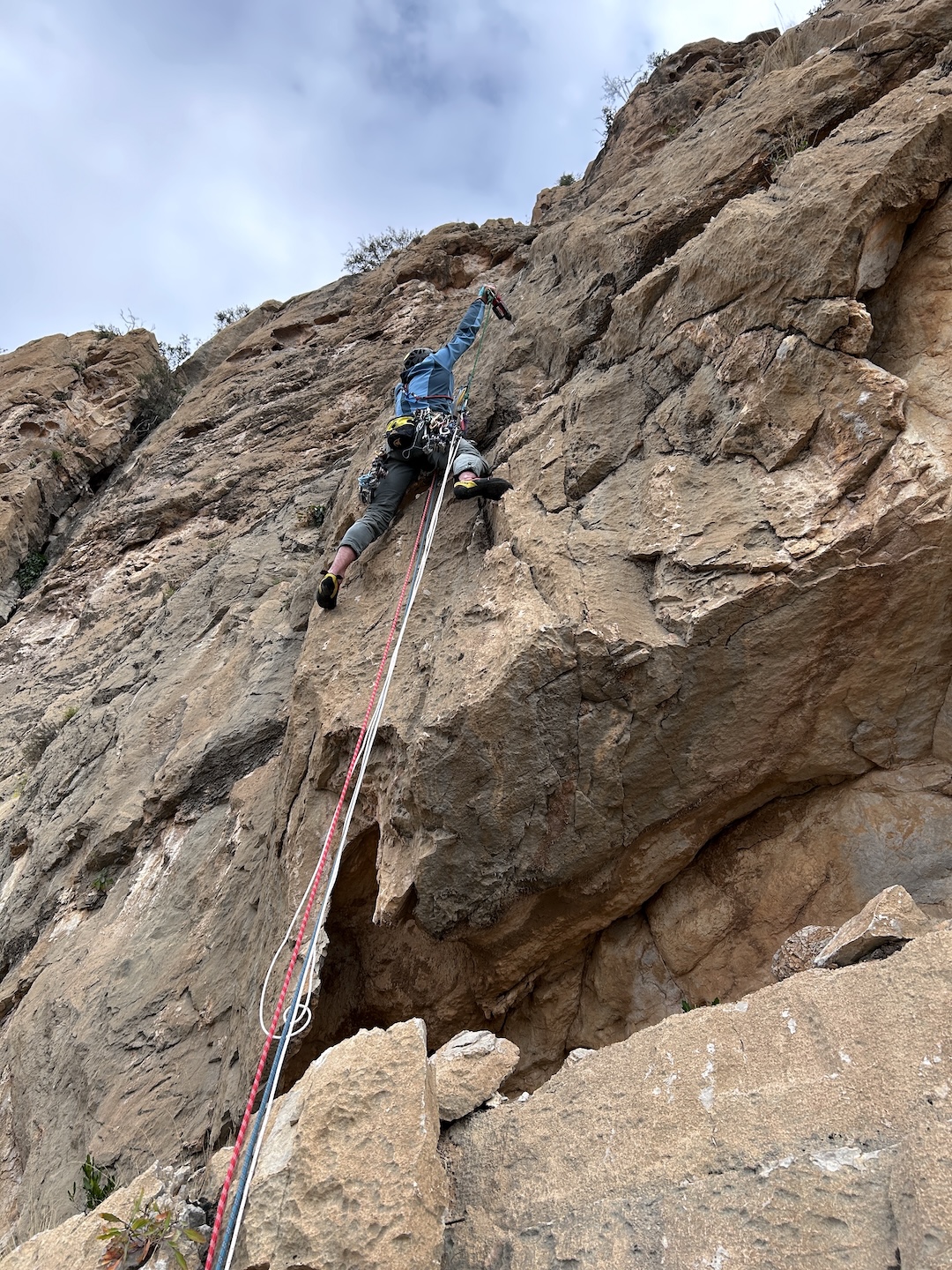 Matteo Monfrini drilling a protection bolt on pitch four (6a) of Drips of Joy (500m, 7b max, 7a mandatory), Said Wall. The team only placed nine bolts on the entire route: six as lead protection and three at belay anchors. 