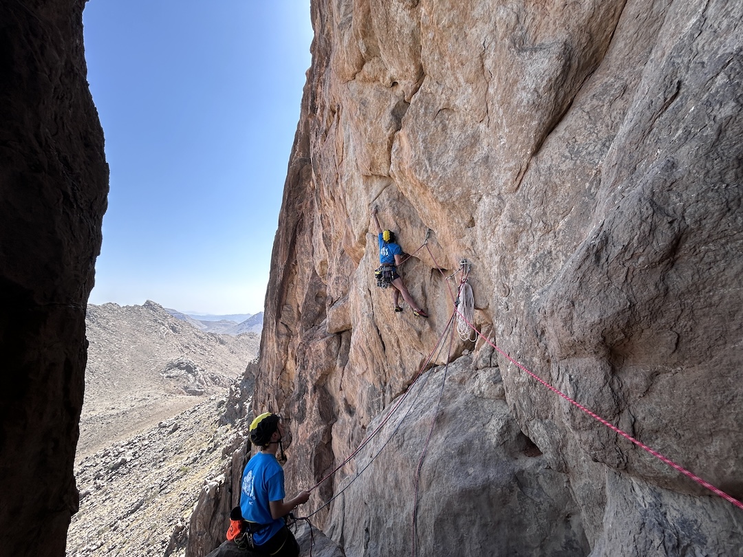 Matteo Monfrini exploring a possible new route on the middle tower of Jabal Fokha. The team thought they were establishing a new climb, but found some previously placed bolts before the line dead-ended. 