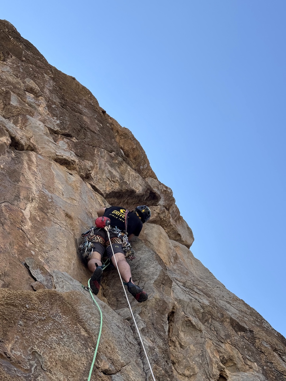 Riccardo Volpiano on pitch two (6b) of Evening Coffee (180m, VIII+ max), Jebel Fokha, Al Hamra Towers. 