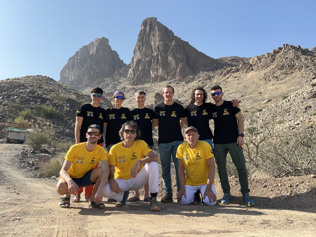 Team Oman 2025. From left to right, in black: Riccardo Volpiano, Erica Bonalda, Lorenzo Toscani, Daniele Lo Russo, Matteo Monfrini, and Marco Cocito; in yellow: Marco Ghisio, Mauro Florit, and Francesco Leardi. 

